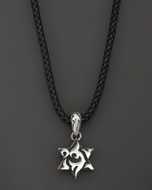 A sterling silver star on a rugged leather chain. From the John Hardy Dayak collection. A sterling silver star on a rugged leather chain. From the John Hardy Dayak collection.