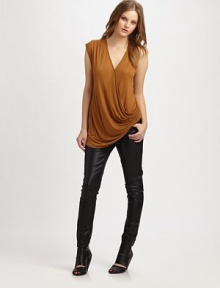 Soft modal and silk jersey draped effortlessly in a crossover tank.V-neckSleevelessDraped bodice90% modal/10% silkDry clean or machine washMade in USAModel shown is 5'8½ (174cm) wearing US size Small. Soft modal and silk jersey draped effortlessly in a crossover tank.V-neckSleevelessDraped bodice90% modal/10% silkDry clean or machine washMade in USAModel shown is 5'8½ (174cm) wearing US size Small.