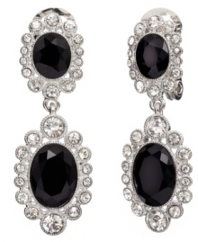 Dazzling and dramatic. Featuring a double-drop silhouette adorned with glittering crystal and glass accents, as well as jet resin, Monet's clip on earrings are sure to add sparkle to your evening style. Crafted in silver tone mixed metal. Approximate drop: 1-3/4 inches. Dazzling and dramatic. Featuring a double-drop silhouette adorned with glittering crystal and glass accents, as well as jet resin, Monet's clip on earrings are sure to add sparkle to your evening style. Crafted in silver tone mixed metal. Approximate drop: 1-3/4 inches.