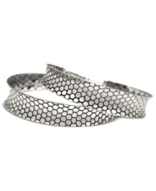 Rock out in these exotic hoops from GUESS. With blue snake texture, the classic earring silhouette gets a boost of fierce fashion. Crafted in silver tone mixed metal. Approximate diameter: 2-1/2 inches. Rock out in these exotic hoops from GUESS. With blue snake texture, the classic earring silhouette gets a boost of fierce fashion. Crafted in silver tone mixed metal. Approximate diameter: 2-1/2 inches.