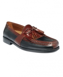 One of the most versatile options for everyday wear, this pair of kilted, tasseled men's loafers goes with just about anything from khakis to corduroys. A tumbled leather upper with contrast trim and stitching makes these men's dress shoes stand out. Leather/rubber outsole. Imported. One of the most versatile options for everyday wear, this pair of kilted, tasseled men's loafers goes with just about anything from khakis to corduroys. A tumbled leather upper with contrast trim and stitching makes these men's dress shoes stand out. Leather/rubber outsole. Imported.