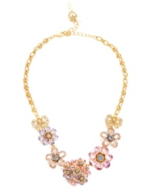 Breathe fresh air into your look with Betsey Johnson's breezy frontal necklace. Crafted in antique gold-plated mixed metal with pink, purple, blue and clear crystal-encrusted flower and ribbon charms. Approximate length: 16 inches + 3-inch extender. Approximate drop: 1-1/5 inches. Breathe fresh air into your look with Betsey Johnson's breezy frontal necklace. Crafted in antique gold-plated mixed metal with pink, purple, blue and clear crystal-encrusted flower and ribbon charms. Approximate length: 16 inches + 3-inch extender. Approximate drop: 1-1/5 inches.