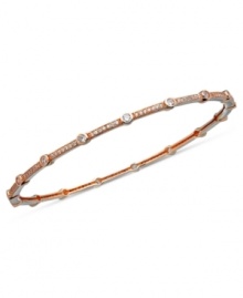 Stack on endless dazzle! This glamorous bangle bracelet from CRISLU is the perfect layering piece with cubic zirconia sparkle (2-1/2 ct. t.w.). Set in 18k rose-gold over sterling silver. Approximate diameter: 2-1/2 inches. Stack on endless dazzle! This glamorous bangle bracelet from CRISLU is the perfect layering piece with cubic zirconia sparkle (2-1/2 ct. t.w.). Set in 18k rose-gold over sterling silver. Approximate diameter: 2-1/2 inches.