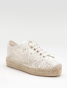 A pretty yet relaxed combo of a sneaker and an espadrille, with a lacy crocheted cotton upper on a rope-edged platform.Rope-covered heel, 1½ (40mm) Rope-edged platform, 1¼ (30mm) Compares to a ¼ heel (5mm) Crocheted cotton upper Partial leather lining Padded insole Rubber sole Made in SpainOUR FIT MODEL RECOMMENDS ordering one half size up as this style runs small. A pretty yet relaxed combo of a sneaker and an espadrille, with a lacy crocheted cotton upper on a rope-edged platform.Rope-covered heel, 1½ (40mm) Rope-edged platform, 1¼ (30mm) Compares to a ¼ heel (5mm) Crocheted cotton upper Partial leather lining Padded insole Rubber sole Made in SpainOUR FIT MODEL RECOMMENDS ordering one half size up as this style runs small.