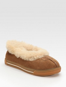 Cozy, soft suede style fully lined in genuine sheepskin.Platform, 1 (25mm) Front logo patch Suede upper Sheepskin lining Padded insole Rubber sole ImportedOUR FIT MODEL RECOMMENDS ordering one size up as this style runs small. Cozy, soft suede style fully lined in genuine sheepskin.Platform, 1 (25mm) Front logo patch Suede upper Sheepskin lining Padded insole Rubber sole ImportedOUR FIT MODEL RECOMMENDS ordering one size up as this style runs small.