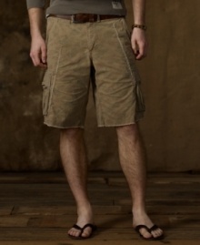 A classic cargo short in durable cotton canvas upholds its rugged roots with ripped-and-repaired stitching and a sun-faded camo print, adding a vintage quality to a modern man's essential. A classic cargo short in durable cotton canvas upholds its rugged roots with ripped-and-repaired stitching and a sun-faded camo print, adding a vintage quality to a modern man's essential.