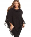 Wrap yourself in the chic warmth of Style&co.'s plus size poncho sweater, finished by a cowl neckline and tassels.
