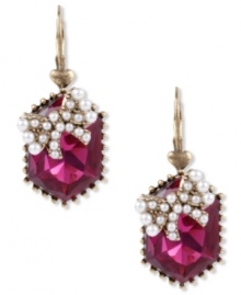 A pretty little package from Betsey Johnson. Drop earrings grab attention with fuchsia-colored crystal accents topped with glass pearl bow accents. A truly cute look for any outfit. Crafted in antiqued gold tone mixed metal. Approximate drop: 1-1/3 inches. A pretty little package from Betsey Johnson. Drop earrings grab attention with fuchsia-colored crystal accents topped with glass pearl bow accents. A truly cute look for any outfit. Crafted in antiqued gold tone mixed metal. Approximate drop: 1-1/3 inches.