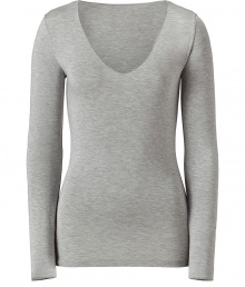 Stylish long sleeved shirt in fine stretch viscose - Very soft, comfortable quality - In classic light grey - With a wide, feminine V-neckline - The cut is slim, fitted and slightly longer, no cuffs - A casual, yet dressed up alternative to a blouse - Pairs with a pant suit, jeans or a cardigan Stylish long sleeved shirt in fine stretch viscose - Very soft, comfortable quality - In classic light grey - With a wide, feminine V-neckline - The cut is slim, fitted and slightly longer, no cuffs - A casual, yet dressed up alternative to a blouse - Pairs with a pant suit, jeans or a cardigan