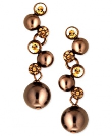 Be the belle of the balls with this pair of earrings from Givenchy. Glass pearls and stunning glass accents star in the earrings crafted from brown gold-tone mixed metal. Approximate drop: 1-1/2 inches. Be the belle of the balls with this pair of earrings from Givenchy. Glass pearls and stunning glass accents star in the earrings crafted from brown gold-tone mixed metal. Approximate drop: 1-1/2 inches.