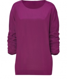 Casual yet chic, this draped sleeve top from DKNY will instantly upgrade your casual basics - Round neck, three-quarter draped sleeves with side ruching, relaxed silhouette, long body - Pair with leather leggings, skinny jeans, or slim trousers Casual yet chic, this draped sleeve top from DKNY will instantly upgrade your casual basics - Round neck, three-quarter draped sleeves with side ruching, relaxed silhouette, long body - Pair with leather leggings, skinny jeans, or slim trousers