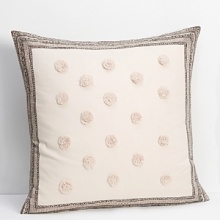 Euro sham with embroidered polka dots allover, bordered by multi stripes.