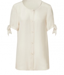 Flowing top in pure silk creates a romantic look - Features deep scoop neck, loose short sleeves with tie detail and button placket - Versatile for work week looks and beyond - Try with bold-colored, high-waisted skirt and heels for a fun office look, or with a distressed denim skirt and boots for a downtown weekend ensemble Flowing top in pure silk creates a romantic look - Features deep scoop neck, loose short sleeves with tie detail and button placket - Versatile for work week looks and beyond - Try with bold-colored, high-waisted skirt and heels for a fun office look, or with a distressed denim skirt and boots for a downtown weekend ensemble