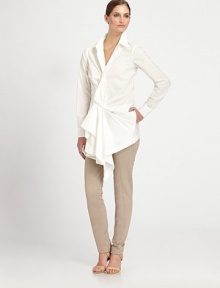 A sculptural front drape elevates the classic shirt-tailored style, in crisply woven paper cotton.Point collarLong sleeves with button cuffsGathered front drape with concealed button closureSide slash pocketsCurved back hemAbout 30 from shoulder to hemCottonDry cleanImported of Italian fabricModel shown is 5'10 (177cm) wearing US size 4. A sculptural front drape elevates the classic shirt-tailored style, in crisply woven paper cotton.Point collarLong sleeves with button cuffsGathered front drape with concealed button closureSide slash pocketsCurved back hemAbout 30 from shoulder to hemCottonDry cleanImported of Italian fabricModel shown is 5'10 (177cm) wearing US size 4.
