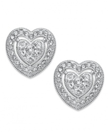 Turn on your heart light. Eliot Danori's crystal stud earrings help you shine on throughout the day. Set in rhodium-plated mixed metal. Approximate diameter: 1/2 inch. Turn on your heart light. Eliot Danori's crystal stud earrings help you shine on throughout the day. Set in rhodium-plated mixed metal. Approximate diameter: 1/2 inch.