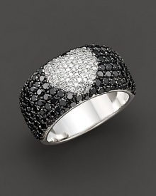 A black diamond band with a white diamond heart. Set in 14 Kt. white gold. A black diamond band with a white diamond heart. Set in 14 Kt. white gold.