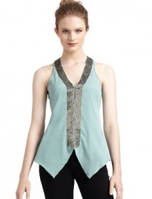 THE LOOKV-neckMulticolor bugle beads embellish the neck and centerSleevelessHidden hook-and-eye frontCutaway front hemRacerbackTHE FITAbout 24 from shoulder to hemTHE MATERIALPolyesterCARE & ORIGINDry cleanImportedModel shown is 5'11 (180cm) wearing US size Small.This item was originally available for purchase at Saks Fifth Avenue OFF 5TH stores. THE LOOKV-neckMulticolor bugle beads embellish the neck and centerSleevelessHidden hook-and-eye frontCutaway front hemRacerbackTHE FITAbout 24 from shoulder to hemTHE MATERIALPolyesterCARE & ORIGINDry cleanImportedModel shown is 5'11 (180cm) wearing US size Small.This item was originally available for purchase at Saks Fifth Avenue OFF 5TH stores.