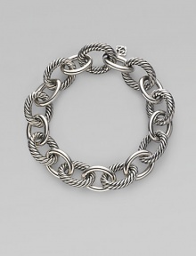 Bold, chunky links, alternating between smooth and cabled, create a bracelet that's both classic and of-the-moment with true Yurman style. Sterling silver Length, about 7½ Spring ring clasp Made in Italy Bold, chunky links, alternating between smooth and cabled, create a bracelet that's both classic and of-the-moment with true Yurman style. Sterling silver Length, about 7½ Spring ring clasp Made in Italy