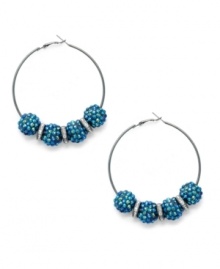 Go for glitter and glam with these hoop earrings from Style&co. A classic silhouette gets energized with blue glitter acrylic stones. Crafted in hematite tone mixed metal. Approximate drop: 2-3/8 inches.