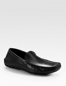 Classic slip-on style is neatly crafted in supple Italian leather for long-lasting comfort and support.Leather upperLeather liningPadded insoleRubber soleMade in Italy Classic slip-on style is neatly crafted in supple Italian leather for long-lasting comfort and support.Leather upperLeather liningPadded insoleRubber soleMade in Italy