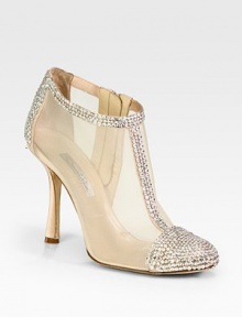 Lifted by a curvy heel, glittering rhinestones add a t-strap-like effect to this semi-sheer mesh and satin confection. Self-covered heel, 4½ (115mm)Rhinestone-coated satin and mesh upperSide zipperLeather lining and solePadded insoleMade in ItalyOUR FIT MODEL RECOMMENDS ordering one size up as this style runs small. Lifted by a curvy heel, glittering rhinestones add a t-strap-like effect to this semi-sheer mesh and satin confection. Self-covered heel, 4½ (115mm)Rhinestone-coated satin and mesh upperSide zipperLeather lining and solePadded insoleMade in ItalyOUR FIT MODEL RECOMMENDS ordering one size up as this style runs small.