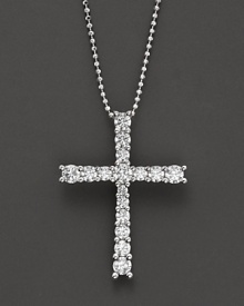 White gold graduated diamond cross pendant with ball chain. White gold graduated diamond cross pendant with ball chain.