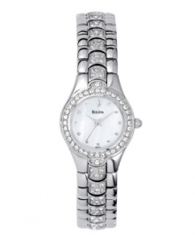 A shining example of good taste. This elegant timepiece features a crystal bezel and a stainless steel bracelet and case. White mother of pearl dial with logo and crystal markers. 3-hand movement. Water resistant to 30 meters. Three-year limited warranty.