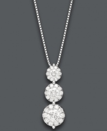 A dazzling, three-stone design turns an ordinary evening into something dramatic. This glamorous pendant features three, circular drops decorated by clusters of round-cut diamonds (3/4 ct. t.w.). Set in 14k white gold. Approximate length: 18 inches. Approximate drop: 1/2 inch. A dazzling, three-stone design turns an ordinary evening into something dramatic. This glamorous pendant features three, circular drops decorated by clusters of round-cut diamonds (3/4 ct. t.w.). Set in 14k white gold. Approximate length: 18 inches. Approximate drop: 1/2 inch.