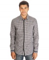 Looking for an eye-catching button front? Solid trim adds interest to this Marc Ecko Cut & Sew checked shirt.