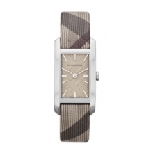 Streamlined sophistication. This sleek timepiece from Burberry boasts iconic check patterns and Swiss precision.