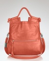 Vacation looks love this lush tote, rendered in tropical-hued leather for a fresh take on this tried and true Foley + Corinna bag.
