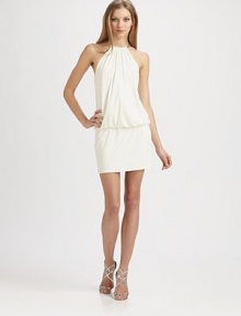 Sexy and chic, tailored with a blouson bodice and accented with a metal ring neck.Halter ring neck with clasp closureBlouson bodiceFitted skirtKeyhole backFully linedConcealed back zipAbout 16 from natural waist95% polyester/5% spandexDry cleanImportedModel shown is 5'10 (177cm) wearing US size 4. Sexy and chic, tailored with a blouson bodice and accented with a metal ring neck.Halter ring neck with clasp closureBlouson bodiceFitted skirtKeyhole backFully linedConcealed back zipAbout 16 from natural waist95% polyester/5% spandexDry cleanImportedModel shown is 5'10 (177cm) wearing US size 4.