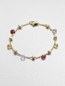 From the Paradise Collection. A colorful blend of semi-precious stones on a delicate link chain with hand-engraved, 18k gold stations. May include amethyst, light amethyst, green amethyst, iolite, garnet, green garnet, orange garnet, tourmalines, citrine, lemon citrine, peridot, pink quartz, smoky quartz and topaz/li 18k goldLength, about 7Lobster clasp closureMade in Italy From the Paradise Collection. A colorful blend of semi-precious stones on a delicate link chain with hand-engraved, 18k gold stations. May include amethyst, light amethyst, green amethyst, iolite, garnet, green garnet, orange garnet, tourmalines, citrine, lemon citrine, peridot, pink quartz, smoky quartz and topaz/li 18k goldLength, about 7Lobster clasp closureMade in Italy
