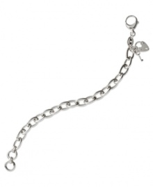 Classic cool. Fossil's link bracelet is crafted from silver-tone stainless steel with a silver-tone charm for a subtle and stylish touch. Approximate length: 7-1/2 inches. Classic cool. Fossil's link bracelet is crafted from silver-tone stainless steel with a silver-tone charm for a subtle and stylish touch. Approximate length: 7-1/2 inches.