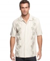 All natural. Show off your earthy side in this leaf-print shirt from Via Europa.