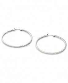 Go full-blitz with these glitzy hoop earrings from Fossil. The classic design is amped up with clear pave crystal accents. Crafted in polished stainless steel. Approximate diameter: 2 inches. Go full-blitz with these glitzy hoop earrings from Fossil. The classic design is amped up with clear pave crystal accents. Crafted in polished stainless steel. Approximate diameter: 2 inches.