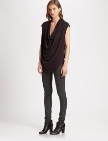 From the HELMUT capsule collection. Softly draped jersey with cap sleeves and a modern shirttail hem hitting below the hips. CowlneckCap sleevesShirttail hem hits below the hipsAbout 30 from shoulder to hem50% modal/50% pima cottonDry cleanImportedModel shown is 5'10 (177cm) wearing US size Small. From the HELMUT capsule collection. Softly draped jersey with cap sleeves and a modern shirttail hem hitting below the hips. CowlneckCap sleevesShirttail hem hits below the hipsAbout 30 from shoulder to hem50% modal/50% pima cottonDry cleanImportedModel shown is 5'10 (177cm) wearing US size Small.