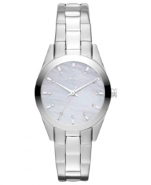 A menswear-inspired steel timepiece with a feminine silhouette by DKNY. A menswear-inspired steel timepiece with a feminine silhouette by DKNY.