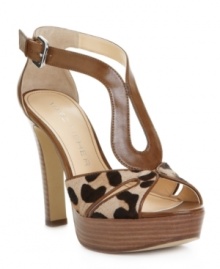 A leg-lengthening platform makes these cork-soled Spray sandals a must-have for summer dressing. From Marc Fisher in a choice of fashion finishes. A leg-lengthening platform makes these cork-soled Spray sandals a must-have for summer dressing. From Marc Fisher in a choice of fashion finishes.