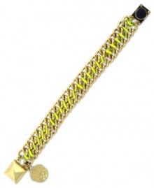Wrap your wrists in colorful chic. Vince Camuto's chain bracelet flaunts a bright yellow cord intertwined in the links. Finished with a pyramid stud magnetic closure. Crafted in gold tone mixed metal. Approximate length: 8 inches.