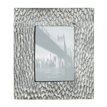 Donna Karan infuses her modern, city-chic aesthetic into this uniquely textured frame from Lenox. Donna Karan infuses her modern, city-chic aesthetic into this uniquely textured frame from Lenox.