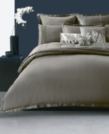 Indulge in elegance. This Donna Karan Modern Classics Truffle decorative pillow with sophisticated metallic embroidery is a chic addition to your bedding ensemble. Zipper closure.
