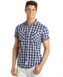 Whether you're relaxing on the beach or hitting the courts, this checked plaid shirt from Calvin Klein Jeans strikes the right balance between preppy and modernity. Whether you're relaxing on the beach or hitting the courts, this checked plaid shirt from Calvin Klein Jeans strikes the right balance between preppy and modernity.