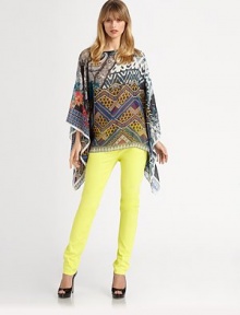 Finespun silk in a vibrant, tribal-inspired print, tailored in a pullover poncho style.BoatneckLong caftan sleevesSilkDry cleanMade in Italy of imported fabricOne size fits mostSIZE & FITModel shown is 5'10 (177cm). Finespun silk in a vibrant, tribal-inspired print, tailored in a pullover poncho style.BoatneckLong caftan sleevesSilkDry cleanMade in Italy of imported fabricOne size fits mostSIZE & FITModel shown is 5'10 (177cm).