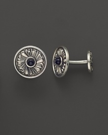 Elegant, intricately textured sterling silver cufflinks, set with onyx, from Buccellati. Elegant, intricately textured sterling silver cufflinks, set with onyx, from Buccellati.
