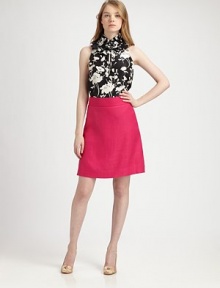 A luxurious, everyday design featuring an allover floral print in classic colors.Ruffle, stand collarSleevelessSelf-tie, keyhole frontPull-on styleAbout 26 from shoulder to hemSilkDry cleanImported Model shown is 5'10½ (179cm) wearing US size 4. A luxurious, everyday design featuring an allover floral print in classic colors.Ruffle, stand collarSleevelessSelf-tie, keyhole frontPull-on styleAbout 26 from shoulder to hemSilkDry cleanImported Model shown is 5'10½ (179cm) wearing US size 4.