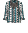 Cause a stylish commotion in this retro-inspired printed and embellished silk top from Milly - Round neckline with crystal and charm bib embellishment, gathering at shoulders, long flared sleeves, exposed back zip closure, all-over print - A-line silhouette - Wear with cropped trousers, high-heel oxfords, and a statement satchel