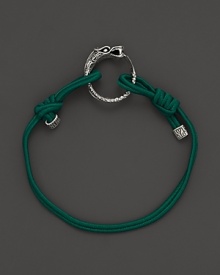 Eastern elements inform John Hardy's dragon head bracelet. It features a cotton cord band with an adjustable sliding closure. Eastern elements inform John Hardy's dragon head bracelet. It features a cotton cord band with an adjustable sliding closure.