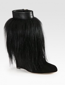 Luxe goat hair covers this suede silhouette topped with leather trim for a look dripping with edgy style. Self-covered wedge, 4¼ (110mm)Goat hair and suede upper with leather trimSide zipLeather lining and solePadded insoleMade in Italy Luxe goat hair covers this suede silhouette topped with leather trim for a look dripping with edgy style. Self-covered wedge, 4¼ (110mm)Goat hair and suede upper with leather trimSide zipLeather lining and solePadded insoleMade in Italy
