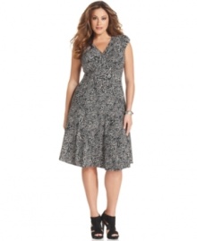 A swirling animal print puts a stylish spin on this plus size dress from Jones New York. A swirling animal print puts a stylish spin on this plus size dress from Jones New York.